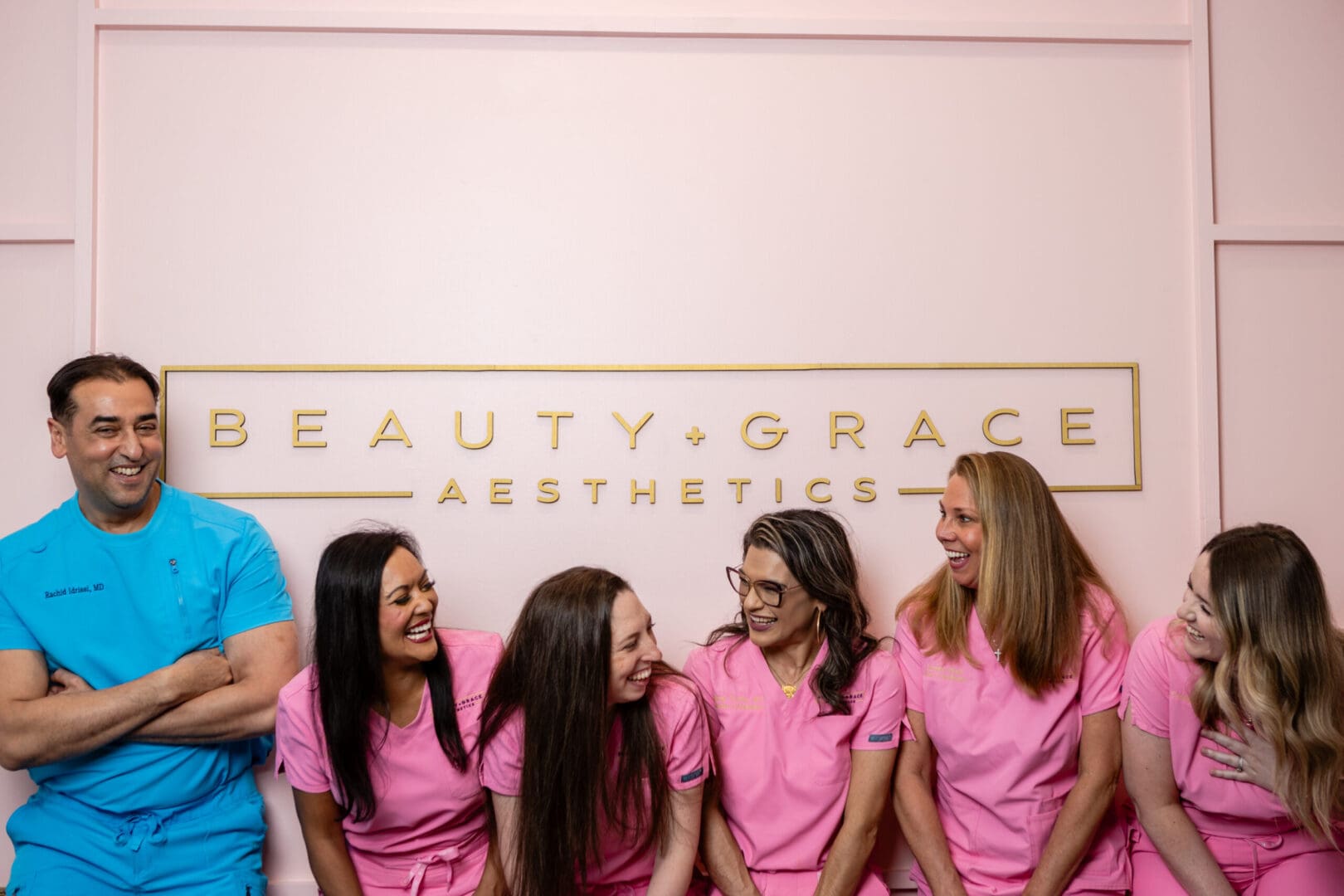 Beauty & Grace Aesthetics team smiling.